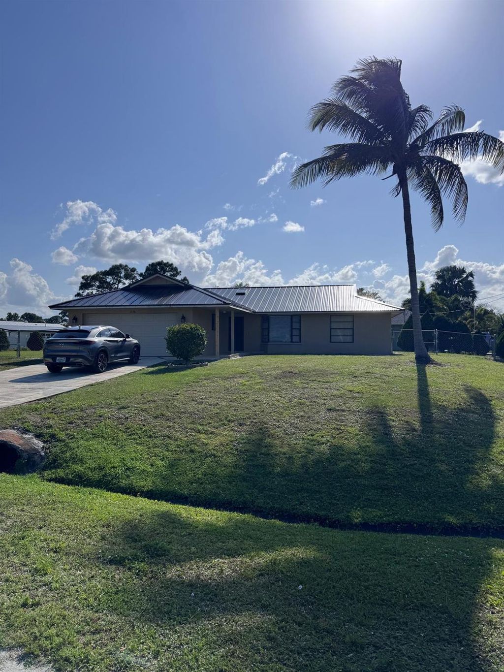 Photo of 2156 SE Aneci Street, Port Saint Lucie, FL 34984 (MLS # R11075457)