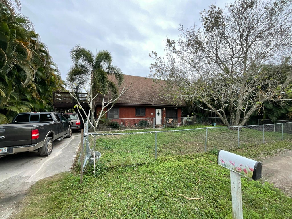 Photo of 6640 RIGGERS Road, Lake Worth, FL 33462 (MLS # B26080702)