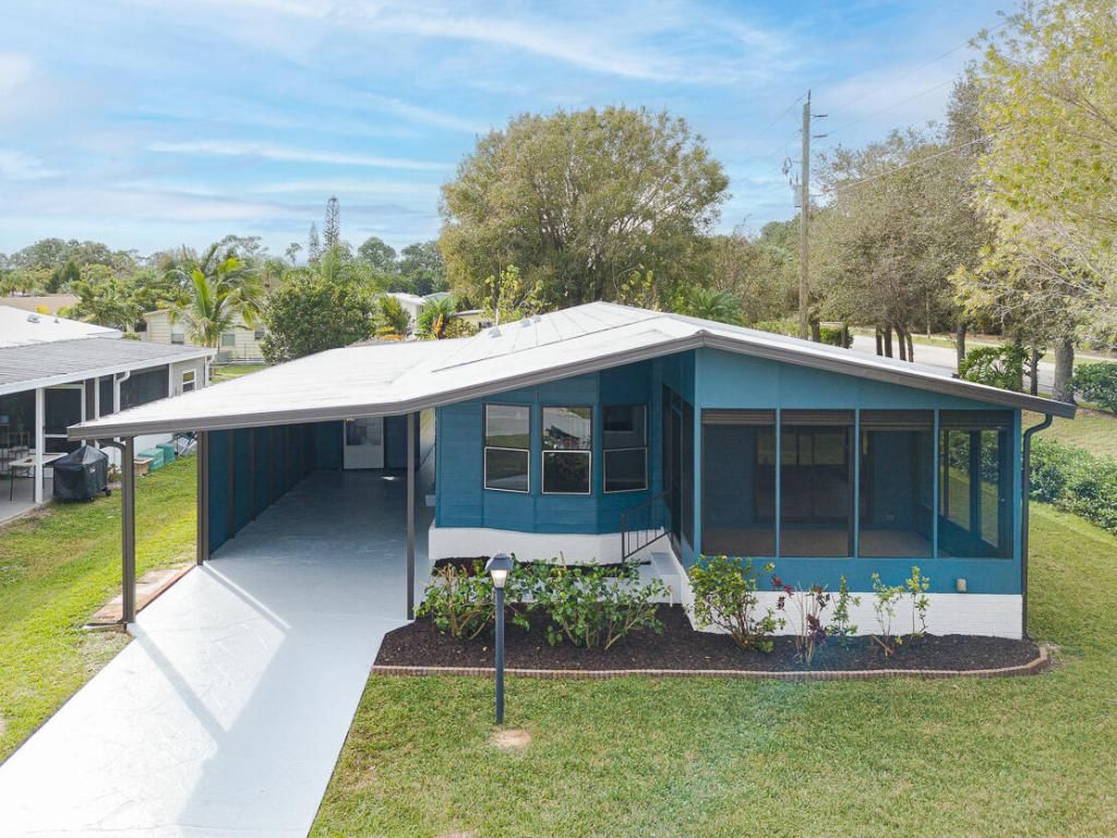 Photo of 2900 SW Thunderbird Trail, Stuart, FL 34997 (MLS # R10956240)