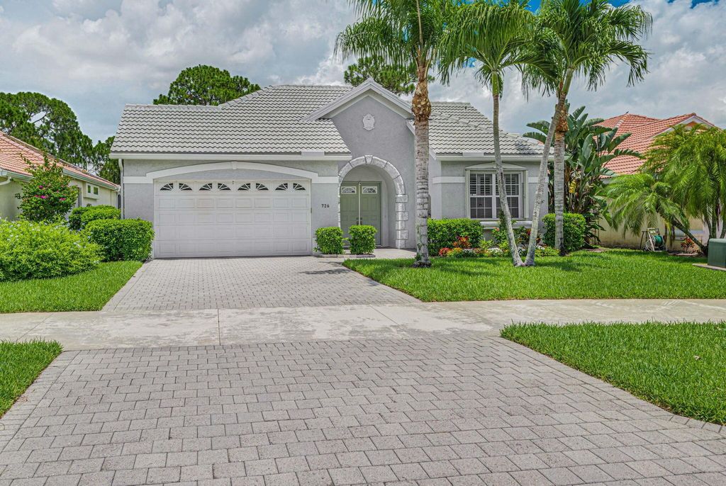 Photo of 726 SW Lake Charles Circle, Port Saint Lucie, FL 34986 (MLS # R10999427)