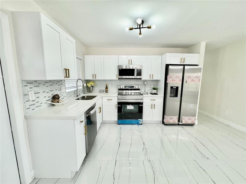 Photo of 1783 Lauderdale Manor Drive, Fort Lauderdale, FL 33311 (MLS # F10503739)