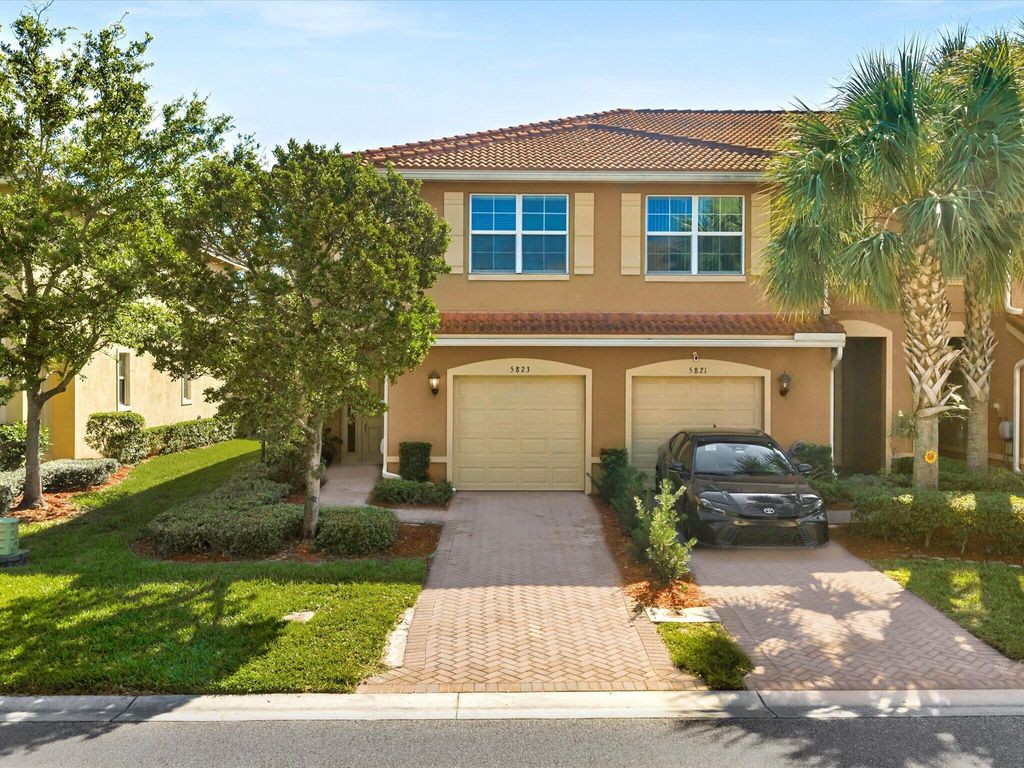 Photo of 5823 Monterra Club Drive, Greenacres, FL 33463 (MLS # B26007238)