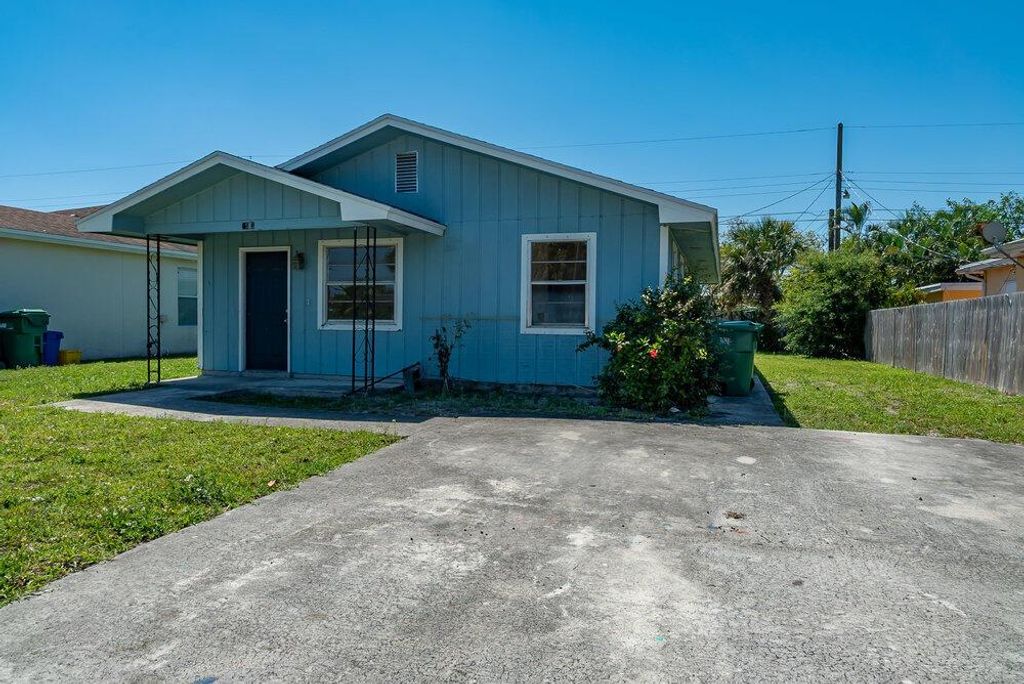 Photo of 1565 W 10th Street, Riviera Beach, FL 33404 (MLS # R10786530)