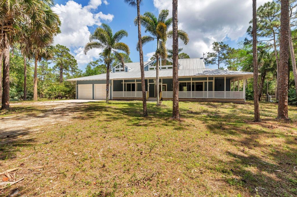 Photo of 12826 141st Lane N, Palm Beach Gardens, FL 33418 (MLS # R11080024)