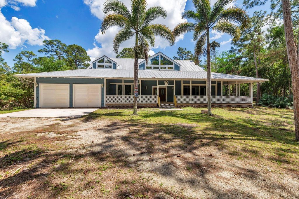 Photo of 12826 141st Lane N, Palm Beach Gardens, FL 33418 (MLS # R11080024)