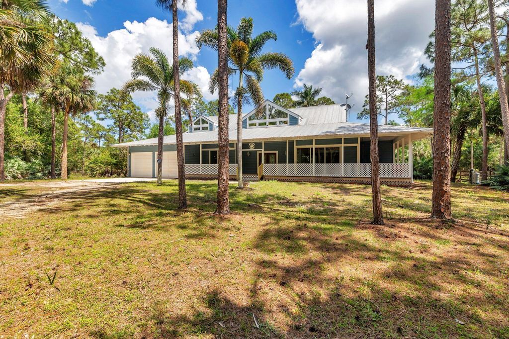 Photo of 12826 141st Lane N, Palm Beach Gardens, FL 33418 (MLS # R11080024)