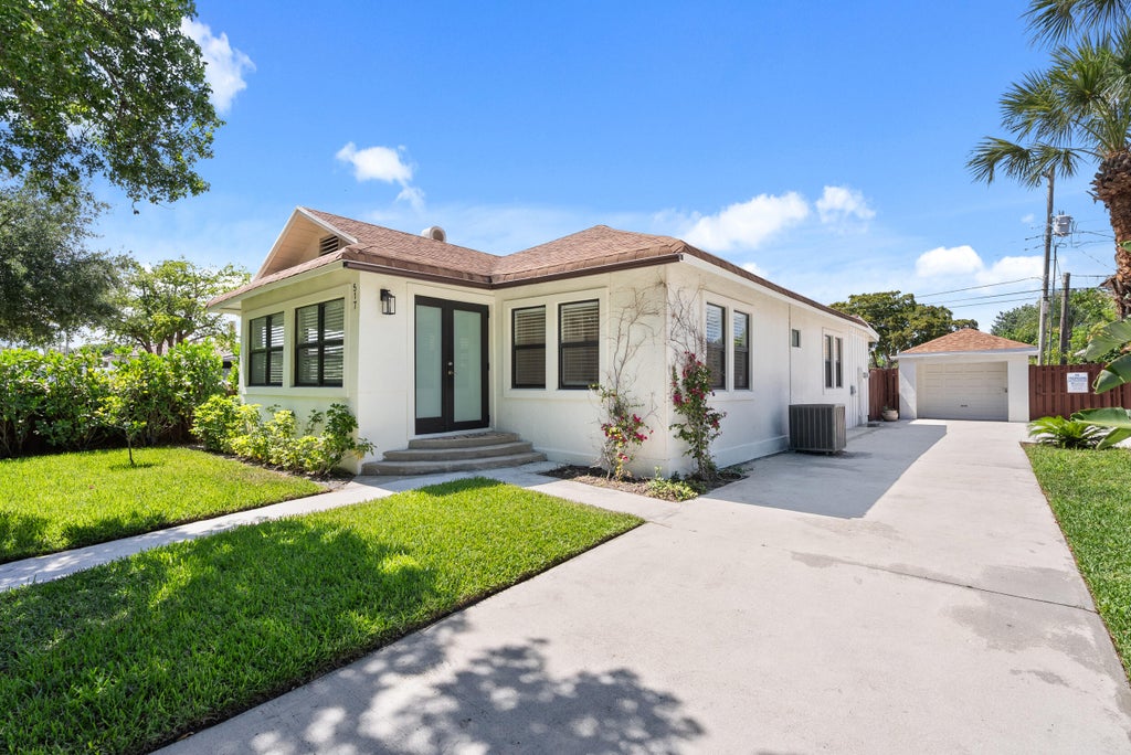 Photo of 517 55th Street, West Palm Beach, FL 33407 (MLS # B26085760)