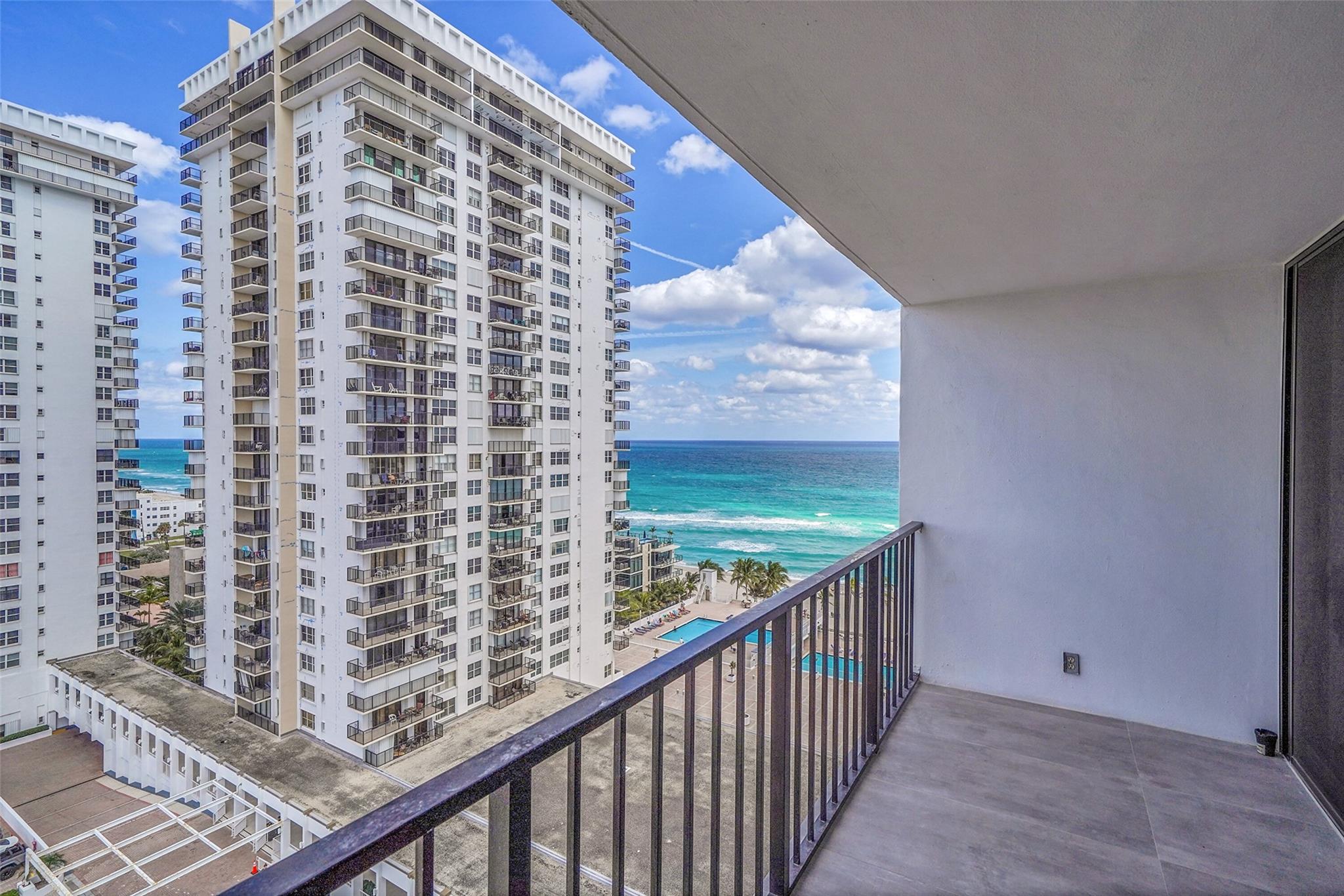 BACK ON MARKET! COASTAL LIVING AT ITS BEST WITH UNPARALLELED HOLLYWOOD BEACH ADDRESS! Enjoy the Sunrise & Sunset ALL in one day from this stunning-fully renovated & spacious CORNER 2 BED/2BATH 15th FLOOR GEM! This unit boasts beautiful and modern wood accent walls & doors, high end stainless steel appliances, modern bathrooms w/shower in Primary Bath, walk in Jacuzzi tub in 2nd bath, Impact windows & doors, Porcelain tile throughout & stunning intracoastal & ocean views. Experience 5 star luxury amenities including 2 heated salt pools, sauna, beach chair & umbrella service, 2 fully equipped gyms, ballroom & billiard room, library, business center, oceanside restaurant, 24 hour security & concierge & more! Walking distance to the famous Hollywood Boardwalk. Priced to sell!