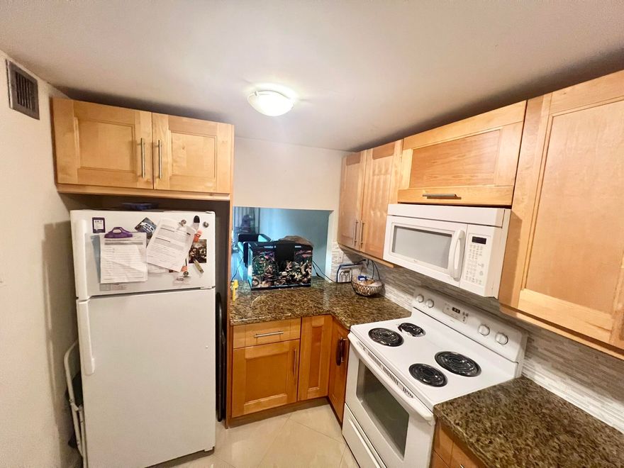 UPDATED 2 BEDROOM IN PRIVATE COUNTRY CLUB COMMUNITY*AVAILABLE FOR MOVE IN JUNE 1, 2026* TILE FLOORING THROUGHOUT* NEW BATHROOM & KITCHEN WITH GRANITE AND STAINLESS STEEL APPLIANCES* SUPER POOL & GOLF VIEW* CLOSE TO 595 FOR EZ COMMUTE AND DAVIE SCHOOLS* AVAILABLE FOR MOVE IN JUNE 1, 2024* COUNTRY CLUB AMENITIES INCLUDE GOLF, TENNIS, PICKLEBALL, BOCCE BALL, SWIMMING POOLS, GYM, SPORTS BAR ,DINING ROOM*CLUB MEMBERSHIP INCLUDED* MINIMUM FICO OF 700 WITH MONTHLY INCOME OF $6300. SORRY NO PETS NO SMOKING*