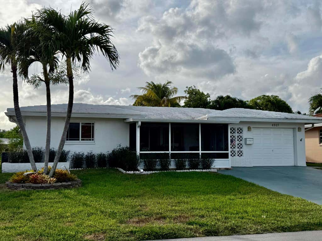 Photo of 4927 NW 47th Terrace, Tamarac, FL 33319 (MLS # B26046460)