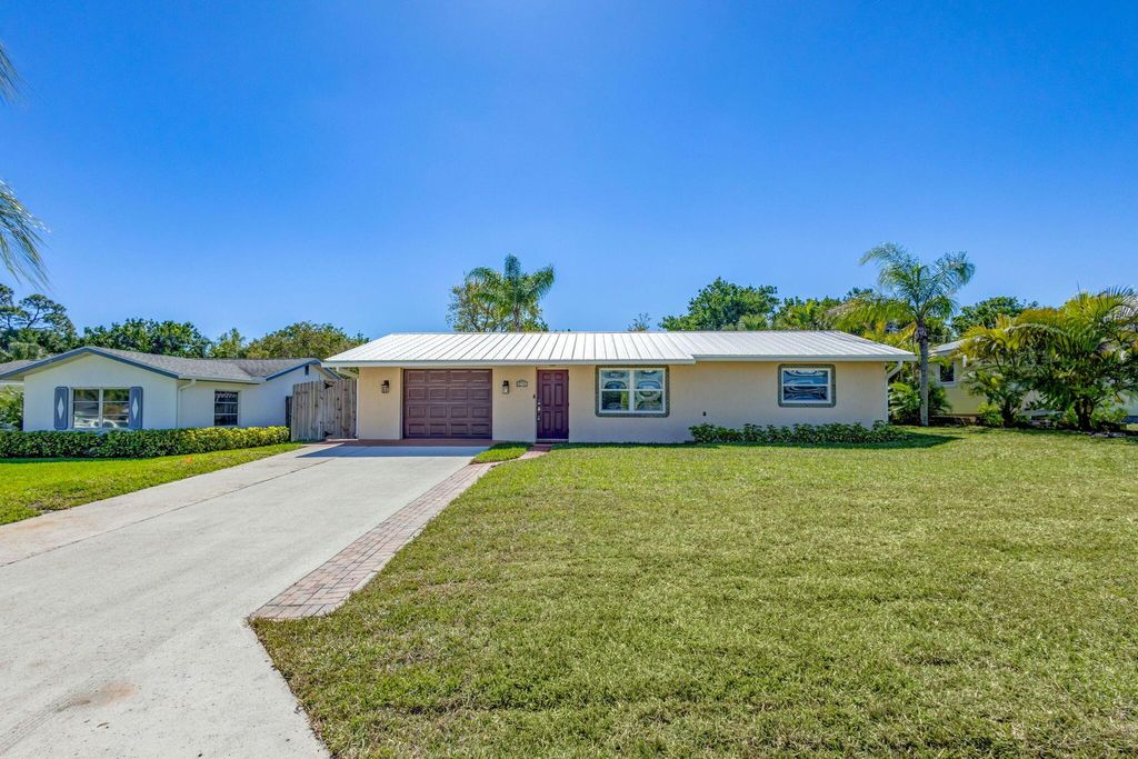 Photo of 8714 SE Jardin Street, Hobe Sound, FL 33455 (MLS # R11114644)
