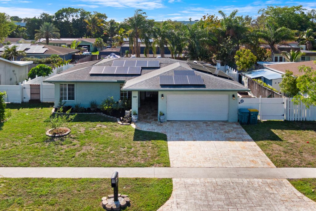 Photo of 8017 NW 74th Terrace, Tamarac, FL 33321 (MLS # B26007609)