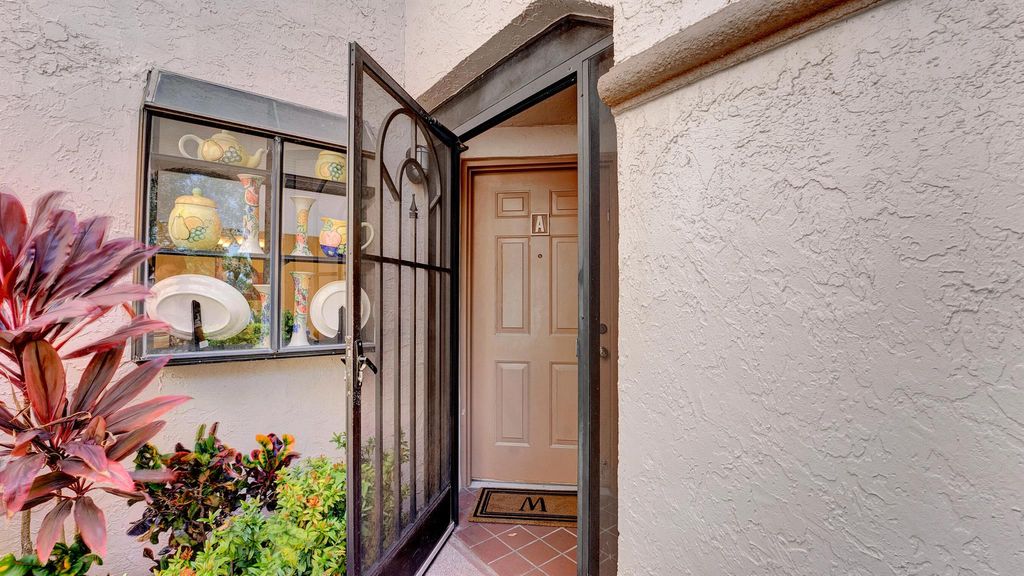 Photo of 5171 Europa Drive #A, Boynton Beach, FL 33437 (MLS # R11083464)