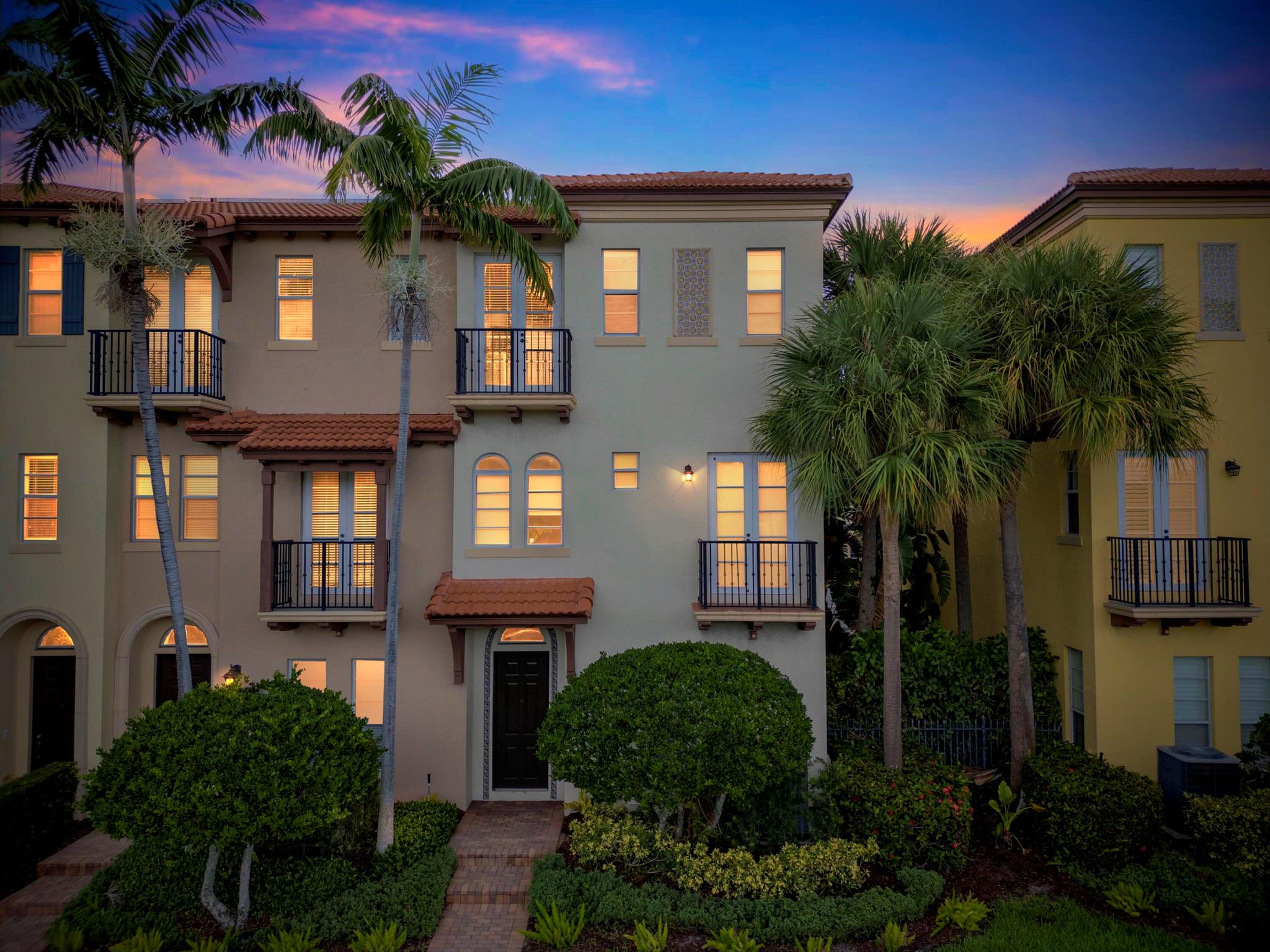 Highly Upgraded Luxurious corner townhome in the lush gated community of Royal Poinciana in East Boca Raton. One mile from the ocean. This 3-bedroom 3.5 bath corner townhome features lots of natural light,12ft high ceilings, upgrader high hat lighting throughout the home, marble & hardwood flooring thru-ought entire home. Large newly remodeled open kitchen w/ stainless steel appliances & quartz countertops, and full home reverse osmosis system, dining/living area with Juliet balcony, private elevator. Master boasts large bathroom w/ jacuzzi, his & her built out closets. All bathrooms have been remodeled and upgraded. Hurricane impact glass on entire home, 2 car garage, & community pool. Extremely convenient location! Minutes to beach, downtown Boca Raton & Delray Beach