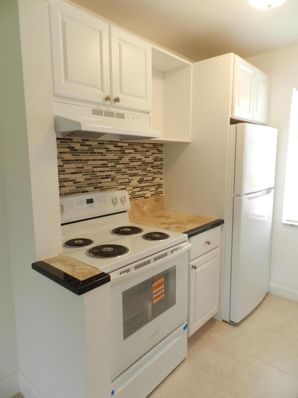 Photo of 141 West Court, Royal Palm Beach, FL 33411 (MLS # B26010198)