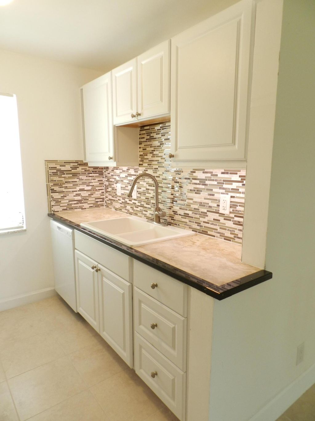 Photo of 141 West Court, Royal Palm Beach, FL 33411 (MLS # B26010198)