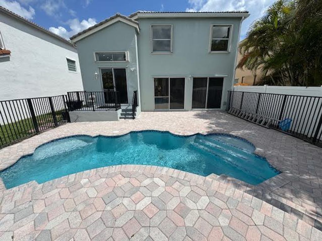 Photo of 9638 Wolcott Place, Wellington, FL 33414 (MLS # B26046379)