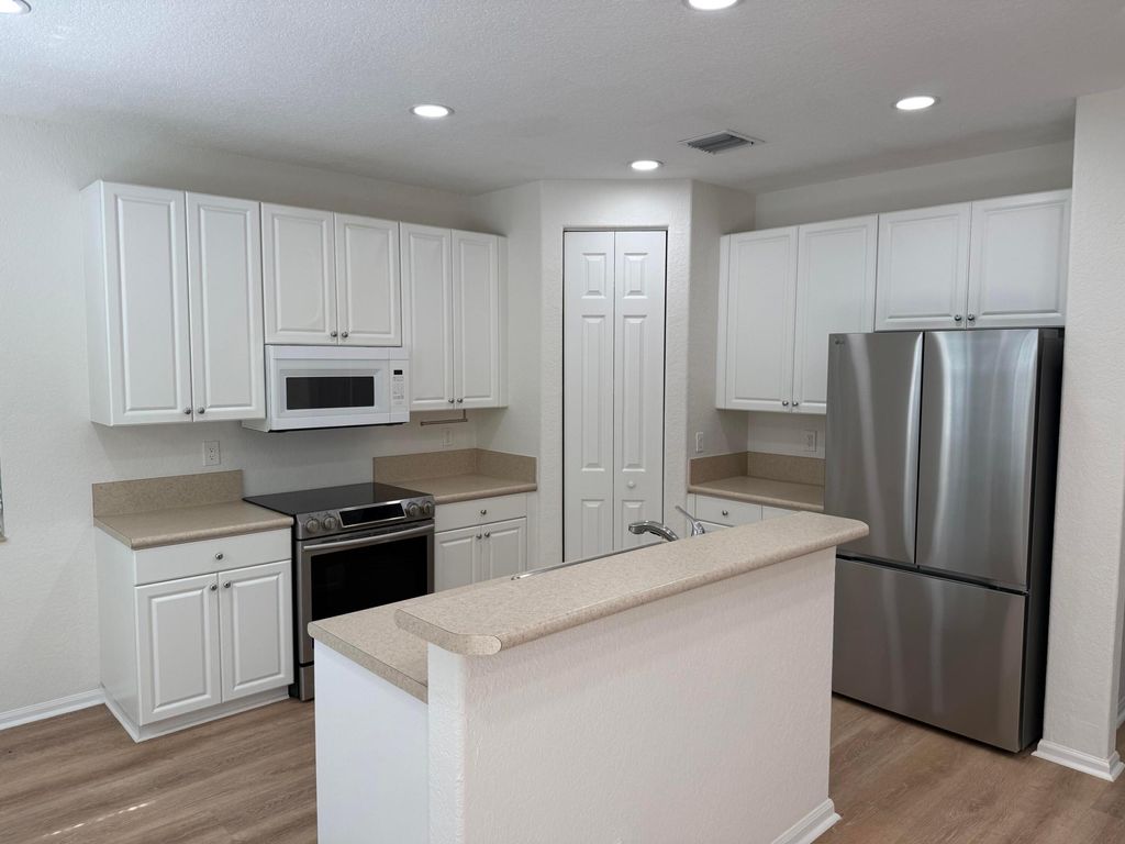 Photo of 4456 Regal Court, Delray Beach, FL 33445 (MLS # R11149027)