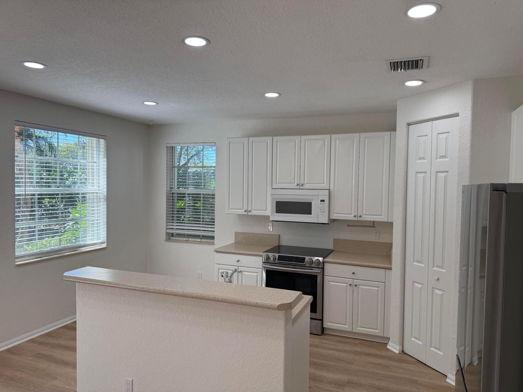 Photo of 4456 Regal Court, Delray Beach, FL 33445 (MLS # R11149027)