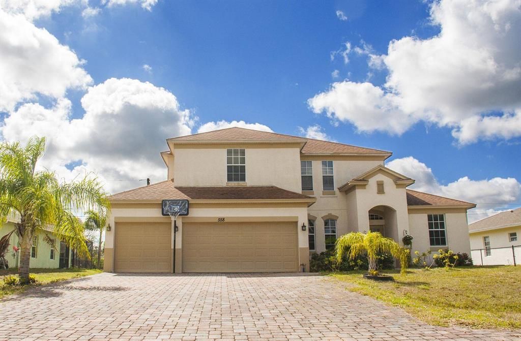 Photo of 558 SW Fields Avenue, Port Saint Lucie, FL 34953 (MLS # R10756281)
