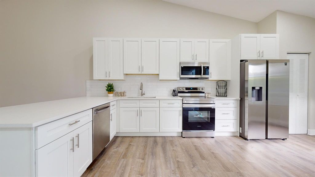 Photo of 3981 Island Club Circle W, Lake Worth, FL 33462 (MLS # R10950930)