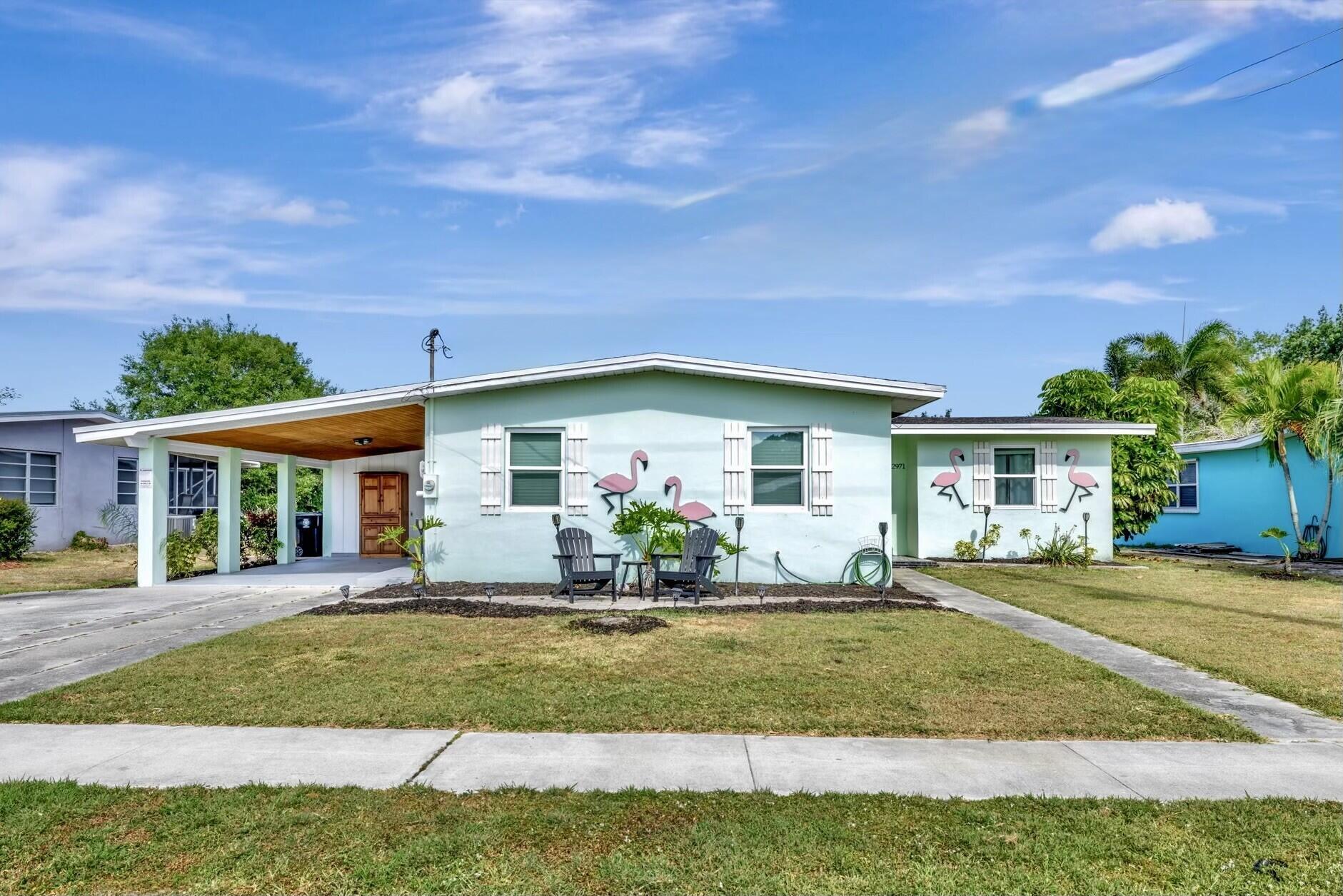Nestled in established Sandpiper Bay area just east of the Saint Lucie River this sought after 4 bedroom, 2 bath house has loads of space! Mid-Century Modern gem with living room opening to family room through pocketed french doors. Primary bedroom has dedicated sitting room great for an office or home gym. Desirable split bedroom plan for flexible living, perfect set up for extended family or vacation rental. Impact windows, indoor laundry room, single carport & storage room. 12-15 minute drive to the beach or downtown Stuart. Easy access to the turnpike, restaurants, shopping and public golf courses. A must see charmer!