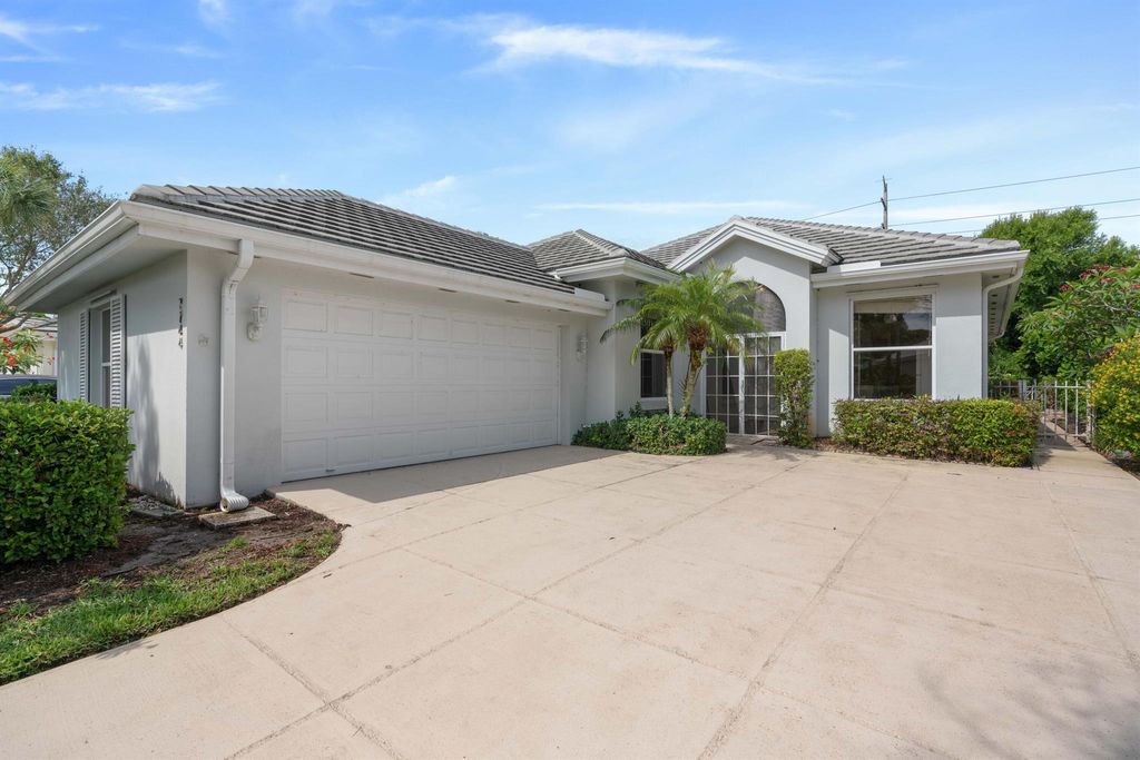 Photo of 7744 SE Needle Palm Circle, Hobe Sound, FL 33455 (MLS # R10968020)