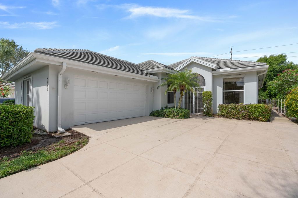 Photo of 7744 SE Needle Palm Circle, Hobe Sound, FL 33455 (MLS # R10968020)