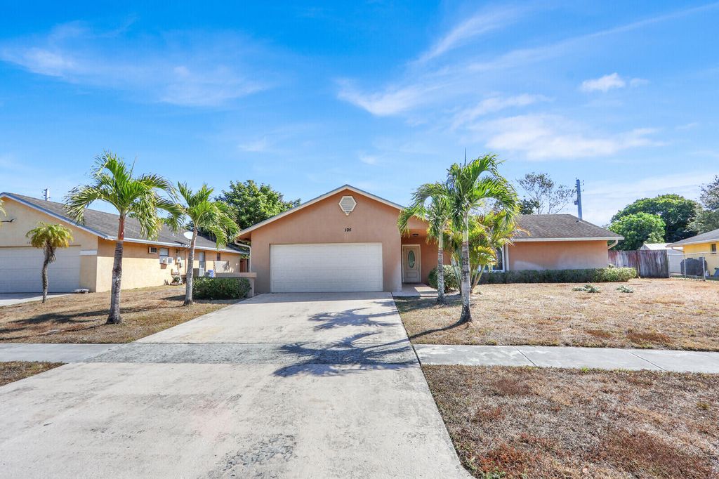 Photo of 105 Sunflower Circle, Royal Palm Beach, FL 33411 (MLS # R11164169)