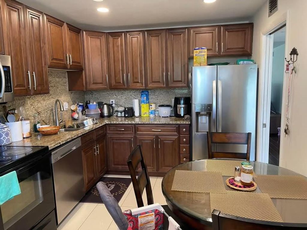 Photo of 2850 Forest Hills Blvd #214, Coral Springs, FL 33065 (MLS # F10542424)