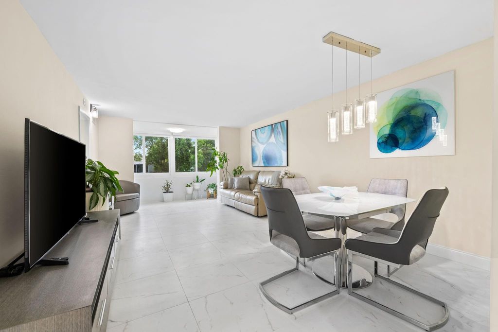 Photo of 9660 Sunrise Lakes Blvd #103, Sunrise, FL 33322 (MLS # F10533404)
