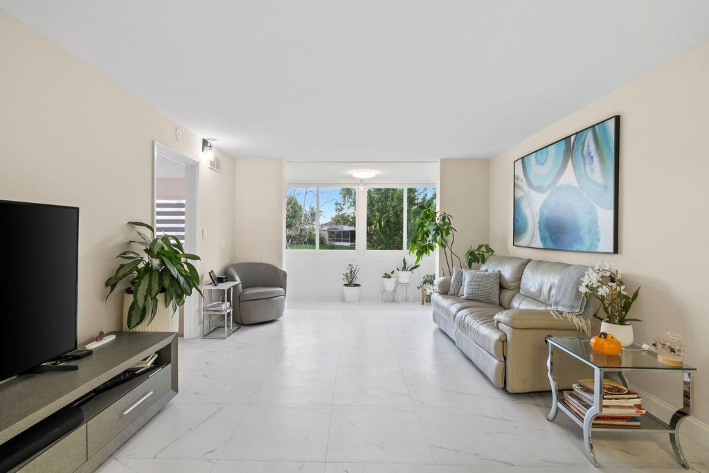 Photo of 9660 Sunrise Lakes Blvd #103, Sunrise, FL 33322 (MLS # F10533404)