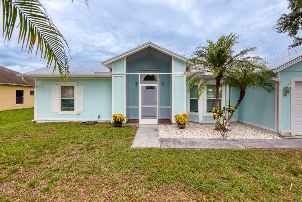 Photo of 1081 SW Kant Avenue, Port Saint Lucie, FL 34953 (MLS # R11119034)