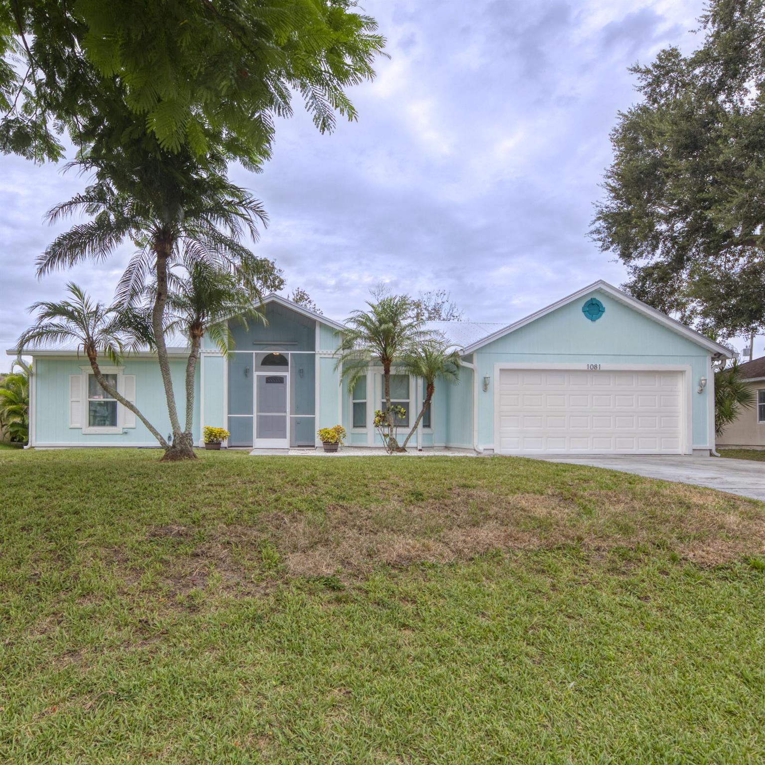 This beautifully maintained 3-bedroom, 2-bath home blends style and function with impact windows and a new 2022 metal roof. The open floor plan showcases warm Spanish tile floors and a kitchen with granite counters, stainless steel appliances, and a handy breakfast bar. Relax on the screened patio overlooking the fully fenced backyard with a storage shed, perfect for outdoor living. With recent updates, including a 2024 water heater, this home is ready for easy Florida living.