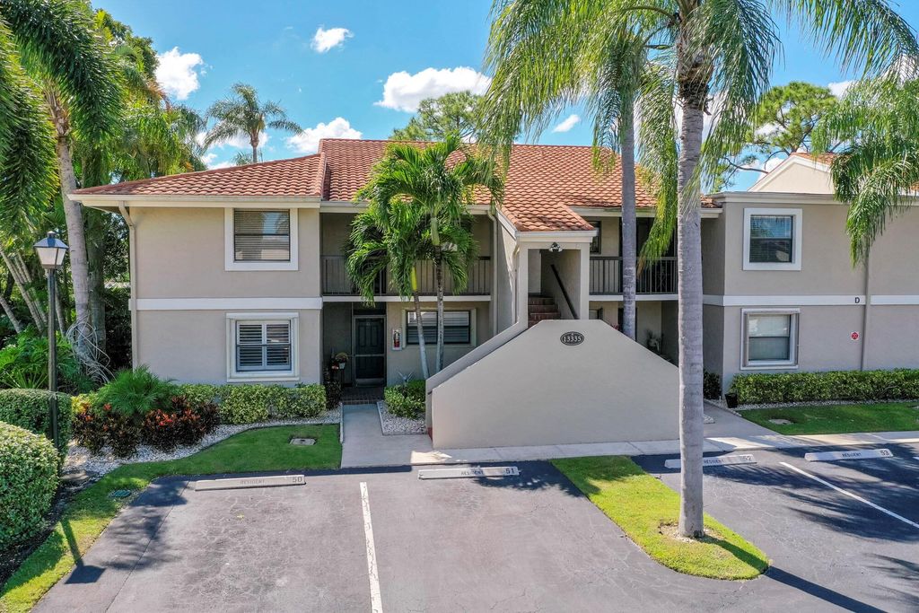 Photo of 13335 Touchstone Place #101, Palm Beach Gardens, FL 33418 (MLS # R10930534)