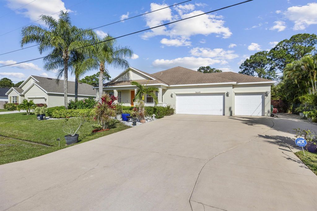 Photo of 3649 SW Bonwold Street, Port Saint Lucie, FL 34953 (MLS # R10963786)