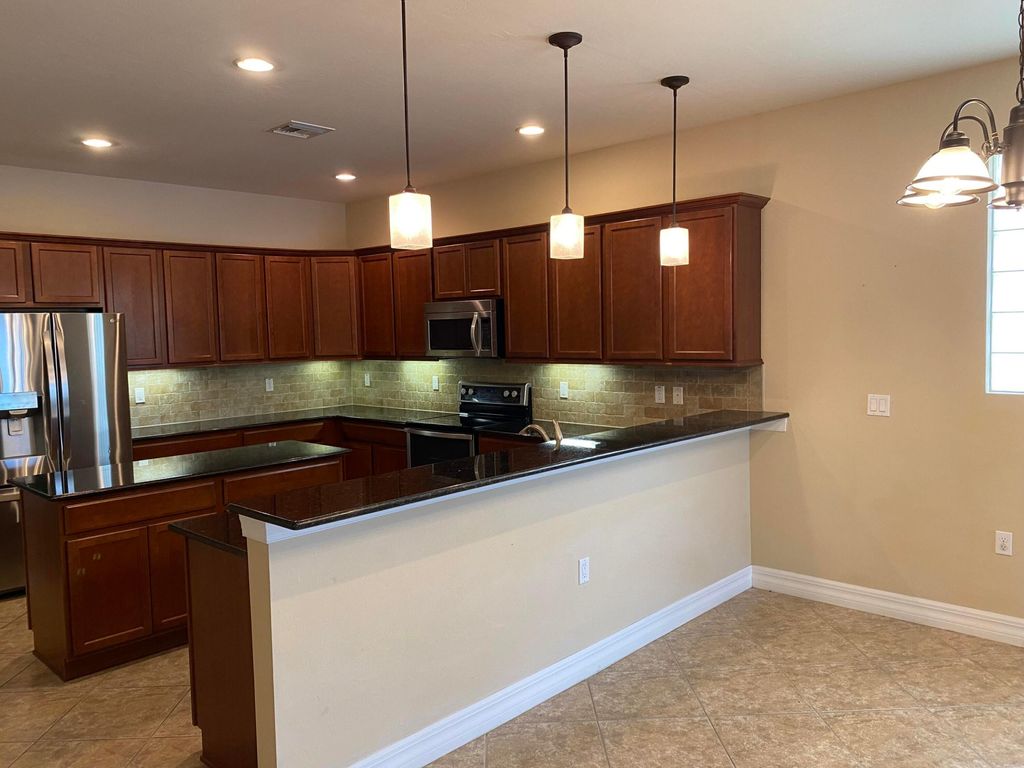Photo of 9202 Wrangler Drive, Wellington, FL 33467 (MLS # B26029461)