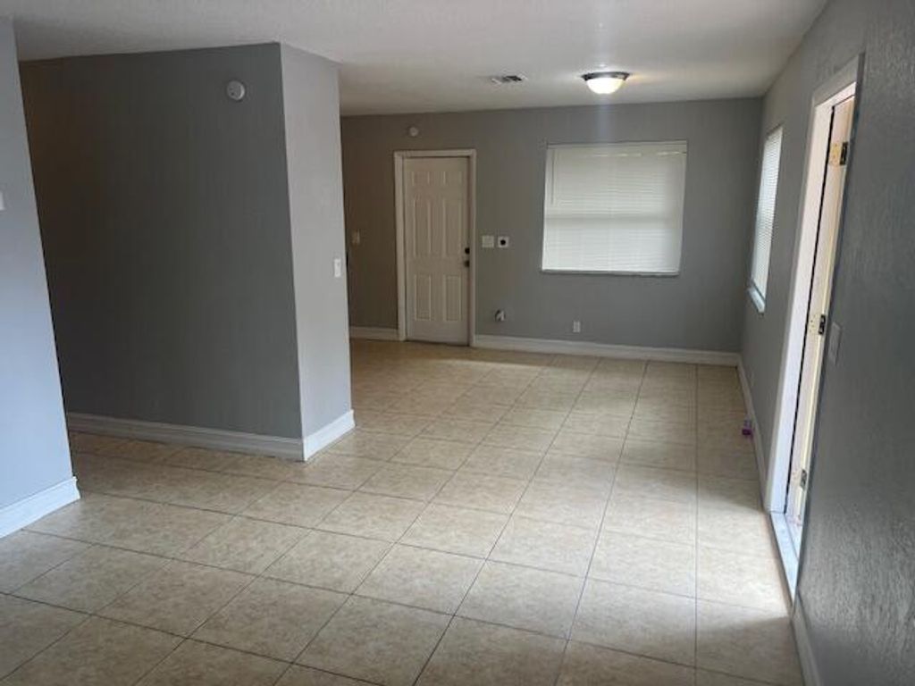 Photo of 1645 NE 3rd Avenue, Delray Beach, FL 33444 (MLS # R10970966)