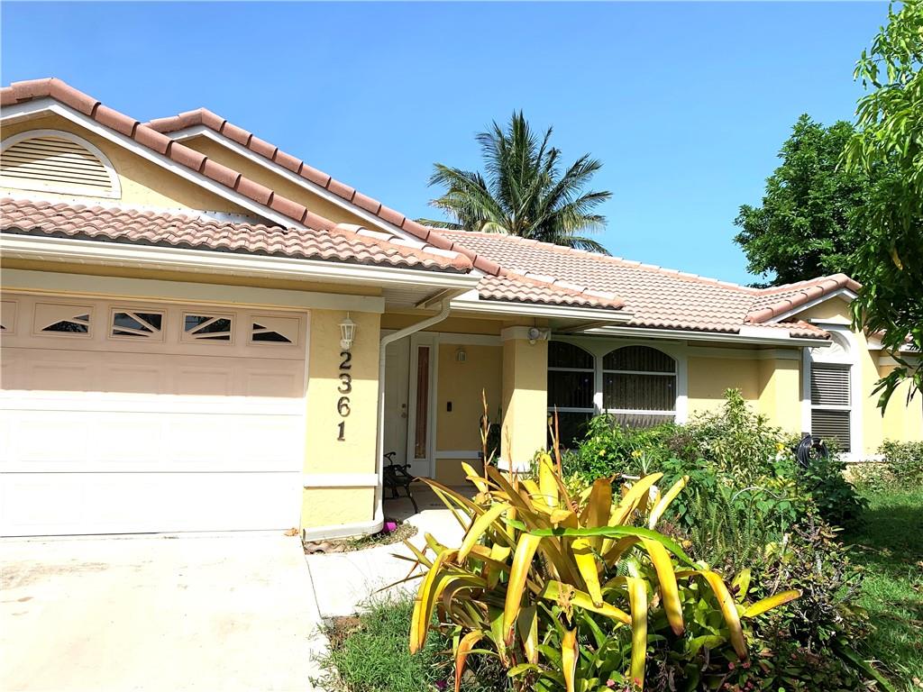 Photo of 2361 SW Monterrey Ln Ln, Port Saint Lucie, FL 34953 (MLS # F10335982)
