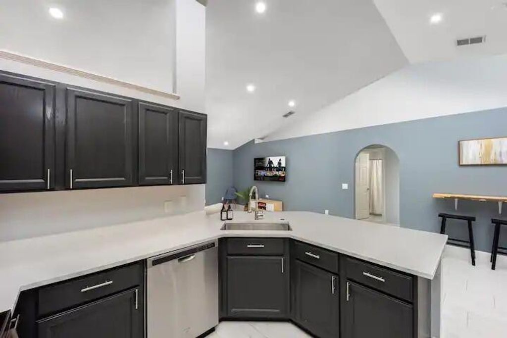 Photo of 1622 SW Lofgren Avenue, Port Saint Lucie, FL 34953 (MLS # R10903843)