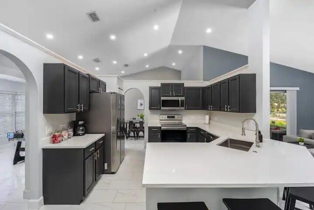 Photo of 1622 SW Lofgren Avenue, Port Saint Lucie, FL 34953 (MLS # R10903843)