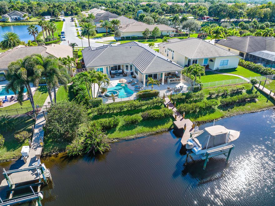 THIS HOME IS A TOTAL WOW. BEAUTIFULLY REMODELED 3057 SF, SINGLE STORY 4 BR + OFFICE, 3.1 BA + 3 CAR GARAGE WATERFRONT HOME in the esteemed Lost River Plantation boating neighborhood. Enjoy 10' volume ceilings, porcelain tile floors, impact windows + doors, + direct water views from the front door to the heated saltwater pool + spa, summer kitchen, entertainment deck and private dock w/a 13,000 lb boat lift. OCEAN ACCESS + NO FIXED BRIDGES. The heart of this home has been transformed into an open living plan, the center grounded by a 23 ft long entertainment peninsula topped w/high-end Super White Quartize w/a waterfall edge.  Floors, kitchen + baths are brand new including a super sumptuous master bath.THIS IS A MUST SEE PROPERTY. NOTHING COMPARES AT THIS PRICE POINT!
