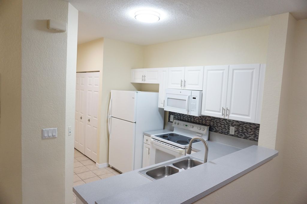 Photo of 1933 Hibiscus Lane, Riviera Beach, FL 33404 (MLS # R10946977)