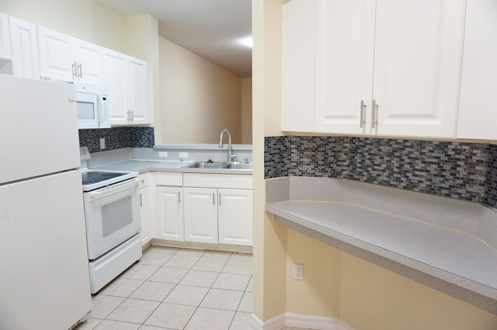 Photo of 1933 Hibiscus Lane, Riviera Beach, FL 33404 (MLS # R10946977)