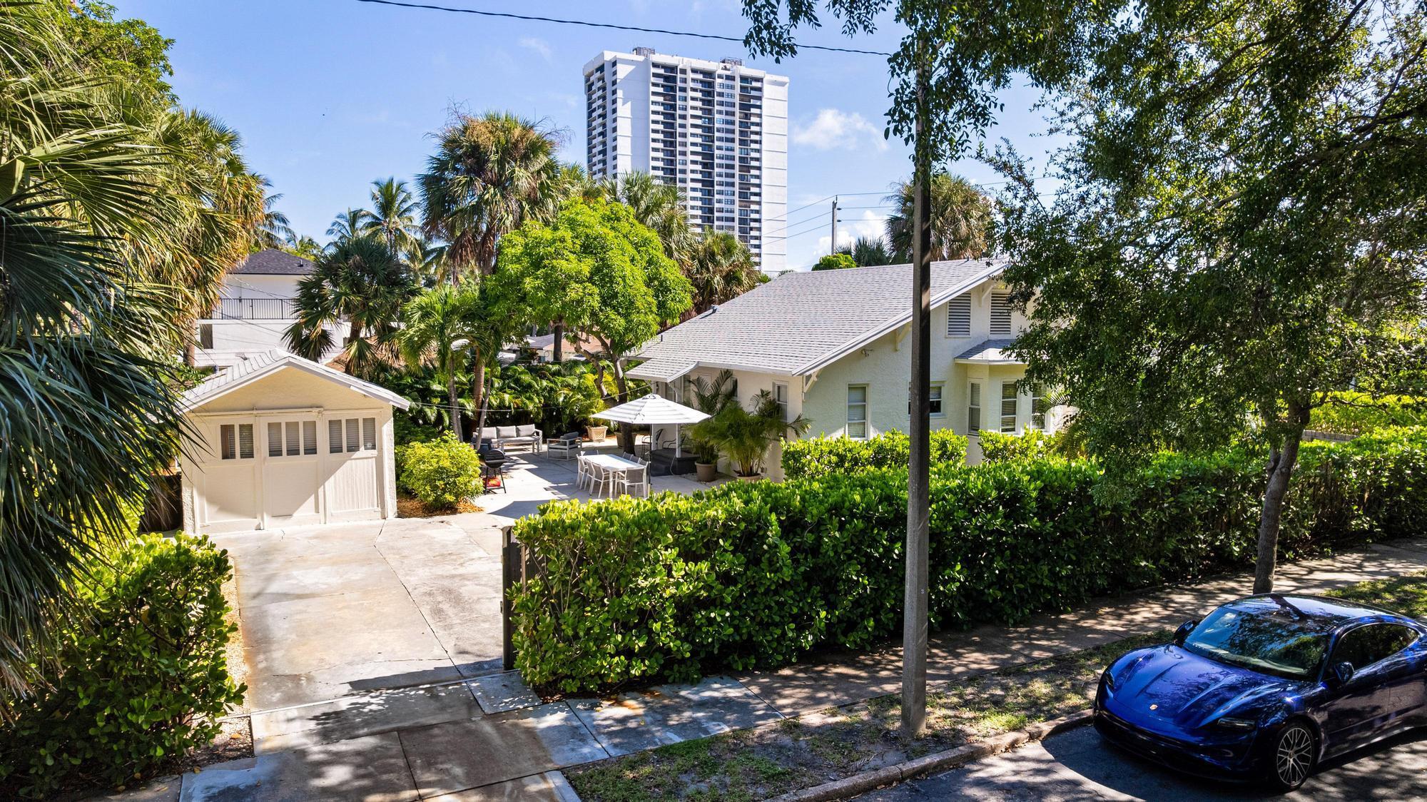 A rare opportunity on Flagler Drive in one of West Palm Beach's most desirable growth corridors. This property sits on a large lot just steps from the Intracoastal, surrounded by luxury projects and redevelopment. The location makes it an outstanding opportunity for end-users, investors, or developers. This well-built charming Century old craftsman's house, preserved with quality construction that has endured the test of time. It is move-in ready, offering 4 bedrooms and 3 bathrooms, plus a separate studio with kitchenette and private bath. A large attic that appears suitable for expanding the living area provides additional upside, and the lot is large enough for a pool and extension.