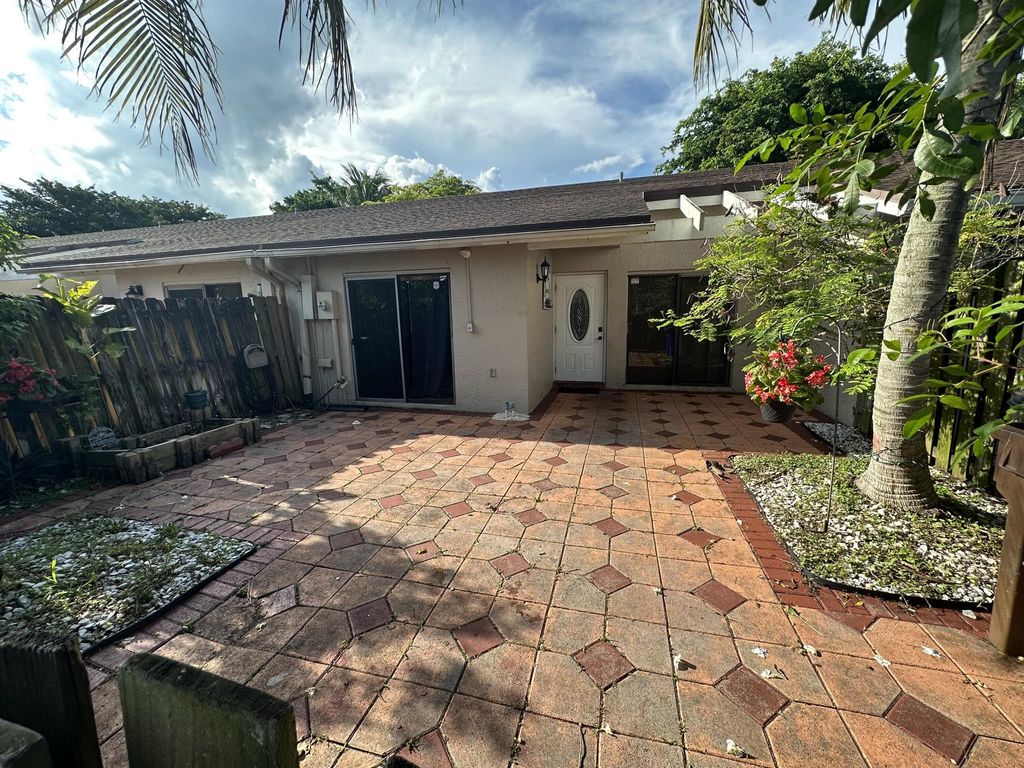 Photo of 935 NW 53rd Street, Deerfield Beach, FL 33064 (MLS # R10912202)