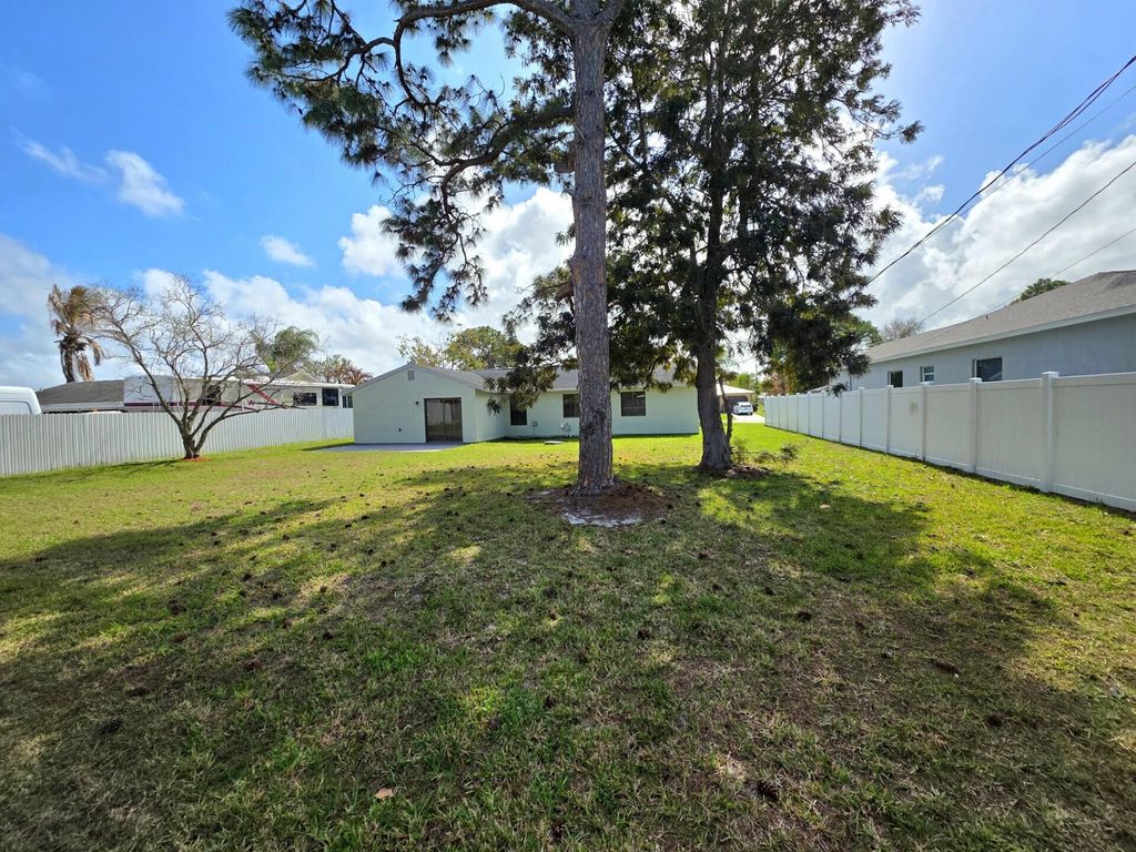 Photo of 2197 SE Genoa Street, Port Saint Lucie, FL 34952 (MLS # B26000443)