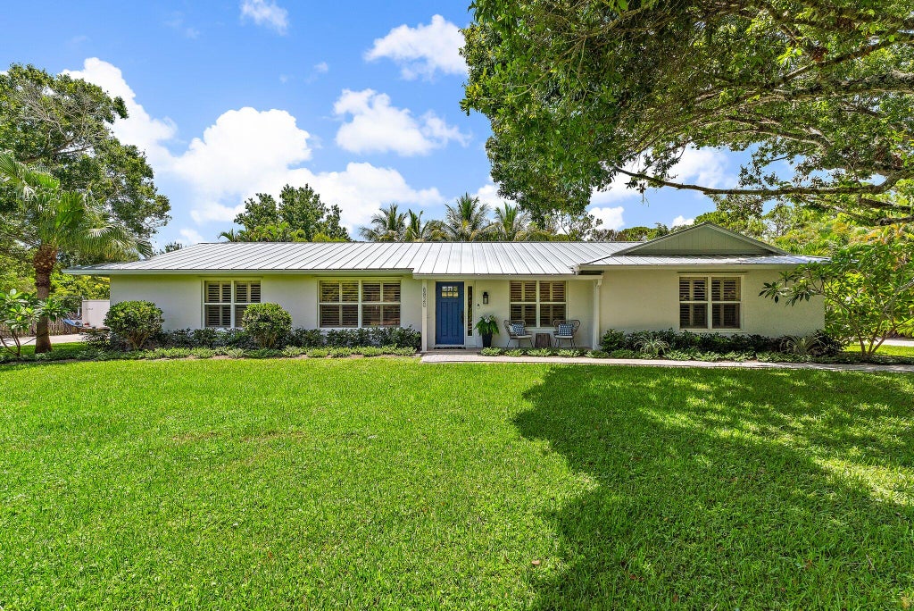 Photo of 6820 140th Lane N, Palm Beach Gardens, FL 33418 (MLS # R11117391)