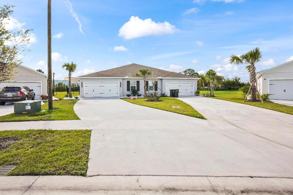 Photo of 309 Raspberry Road, Fort Pierce, FL 34981 (MLS # R11147946)