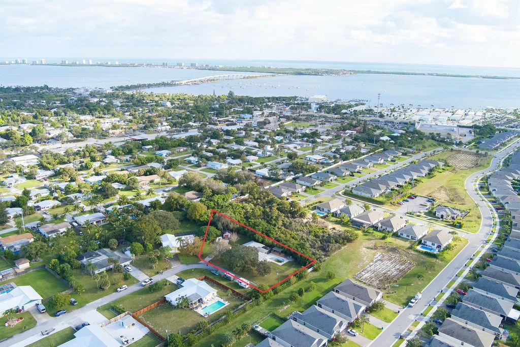 Photo of 1499 NE 29th Terrace, Jensen Beach, FL 34957 (MLS # R10942282)